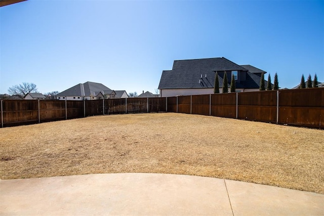 view of yard featuring a fenced backyard