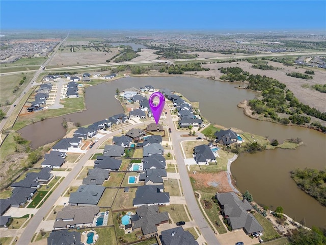 13216 Knight Island Dr, Oklahoma City, OK 73142 - bird's eye view featuring a water view and a residential view