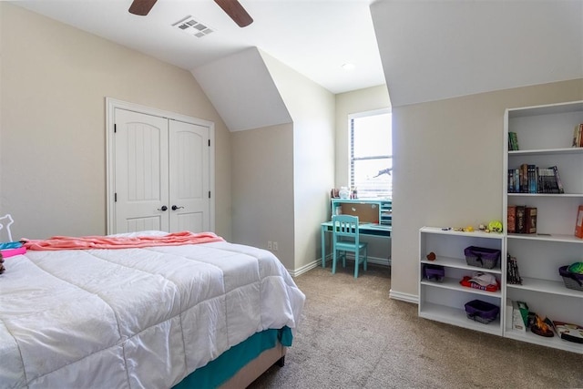 13216 Knight Island Dr, Oklahoma City, OK 73142 - bedroom with a closet, baseboards, carpet floors, visible vents, and ceiling fan