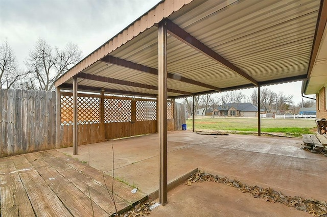 view of patio / terrace featuring fence