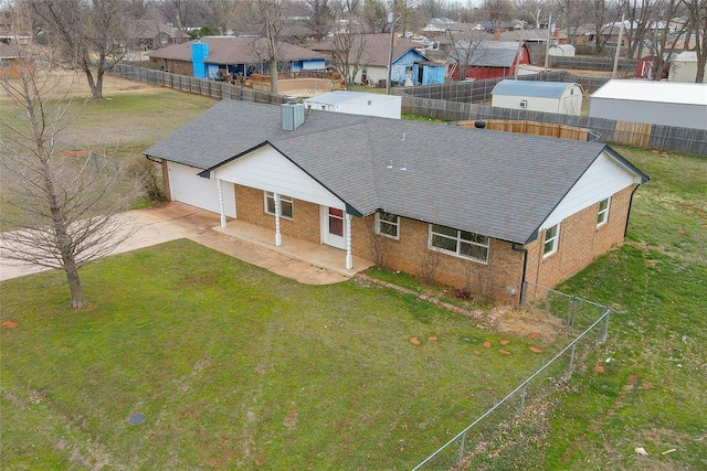 birds eye view of property with a residential view