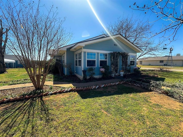 view of front of property with a front lawn