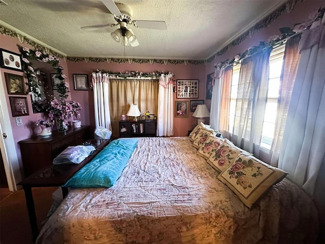 bedroom featuring a textured ceiling and ceiling fan