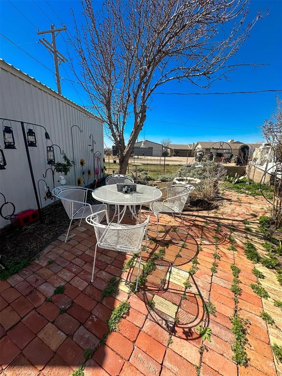 view of patio featuring fence