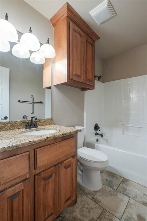 bathroom with visible vents, tub / shower combination, toilet, and vanity