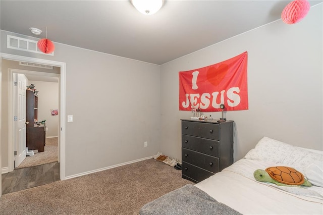 bedroom featuring carpet flooring, baseboards, and visible vents