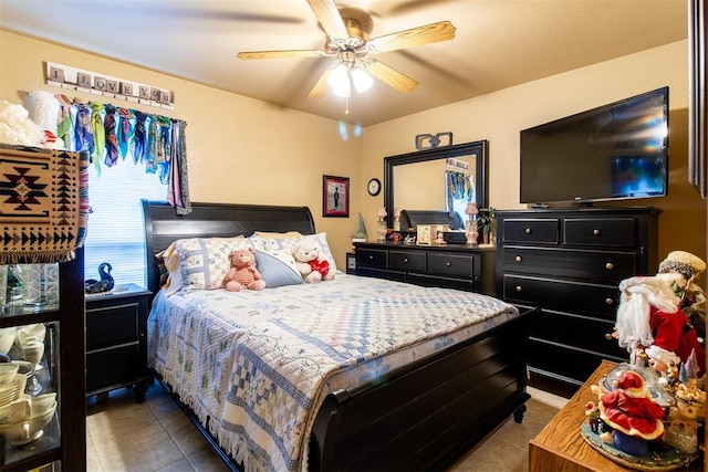 bedroom featuring tile patterned flooring and a ceiling fan