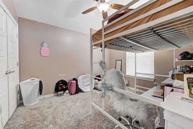 bedroom featuring carpet floors, baseboards, and ceiling fan