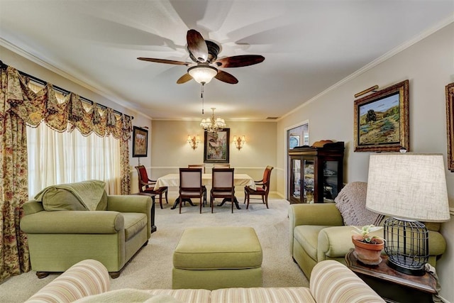 living room with ceiling fan with notable chandelier, crown molding, light colored carpet, and visible vents