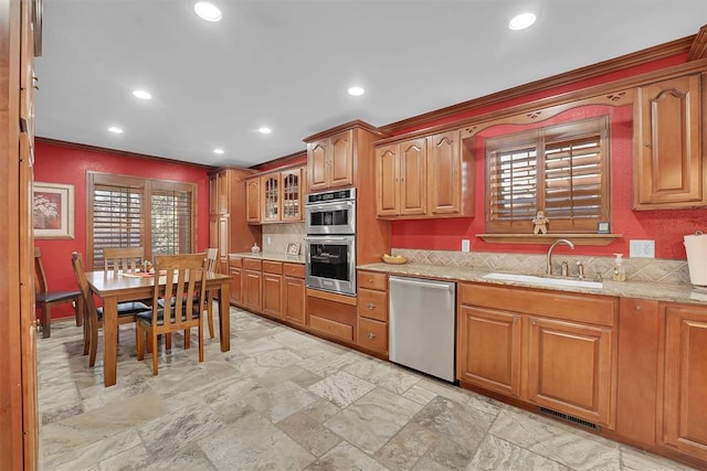 kitchen featuring visible vents, recessed lighting, plenty of natural light, stainless steel appliances, and a sink