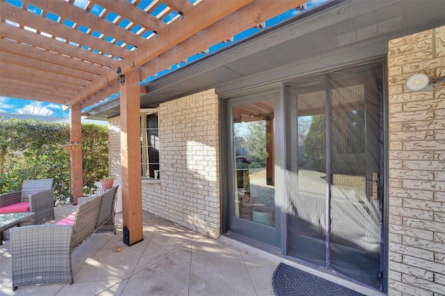 view of patio / terrace featuring a pergola