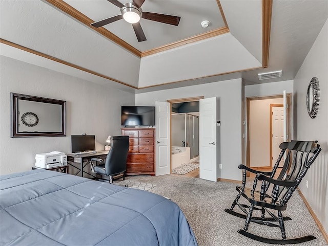 bedroom featuring visible vents, ensuite bathroom, baseboards, carpet flooring, and a raised ceiling