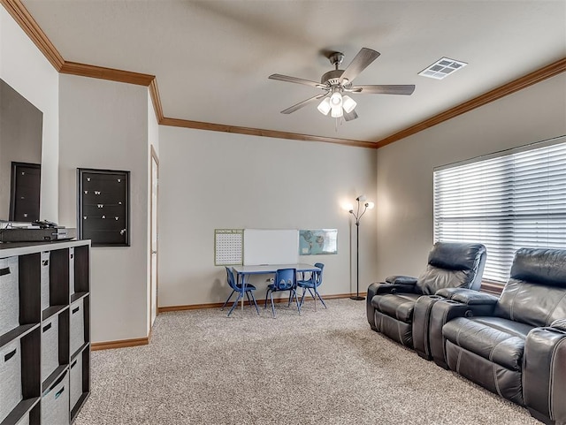 living area with visible vents, crown molding, baseboards, light carpet, and a ceiling fan