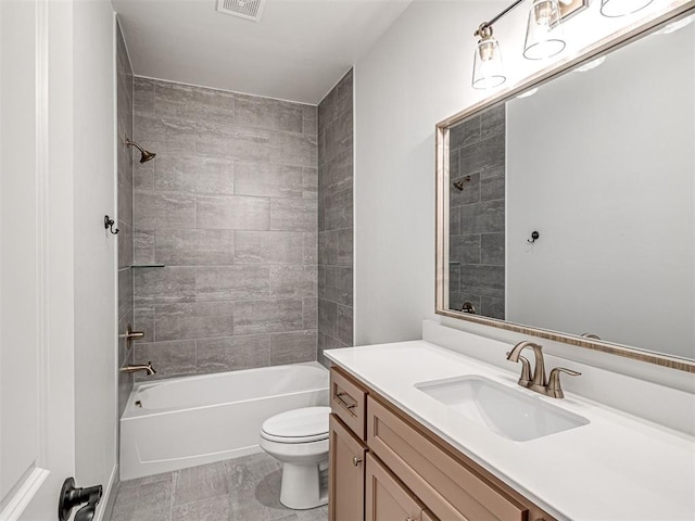 full bath featuring shower / bath combination, visible vents, toilet, and vanity