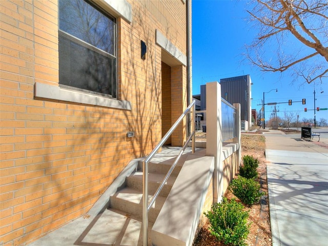 exterior space with brick siding