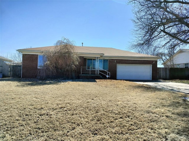 ranch-style house featuring brick siding, an attached garage, concrete driveway, and fence