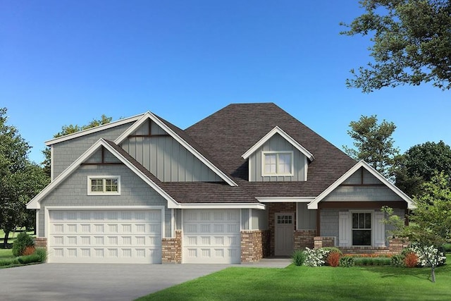 craftsman inspired home featuring driveway, roof with shingles, an attached garage, a front yard, and brick siding