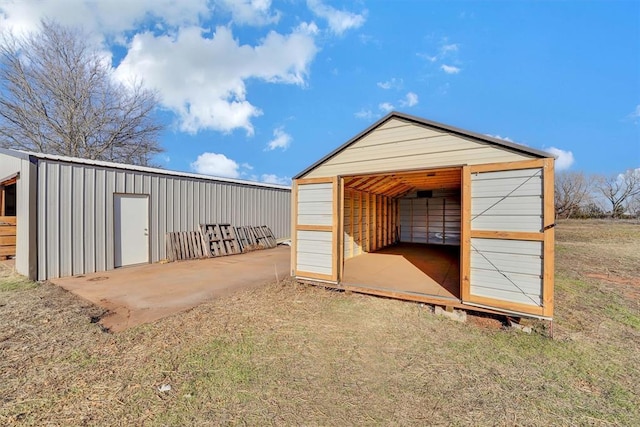 view of outbuilding featuring an outbuilding