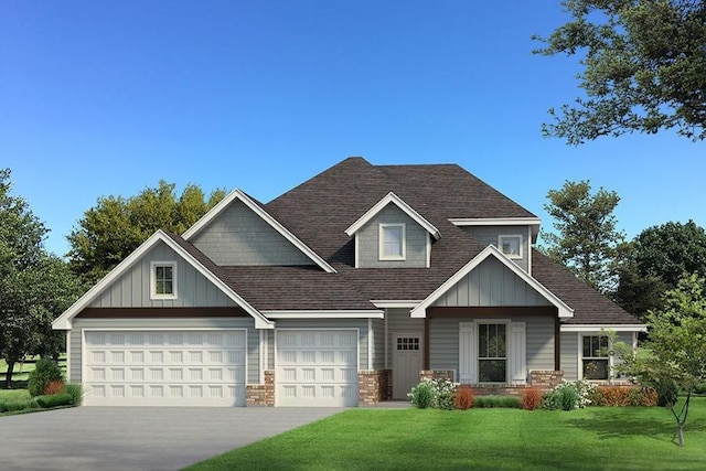 craftsman house featuring a front yard, concrete driveway, board and batten siding, and a shingled roof