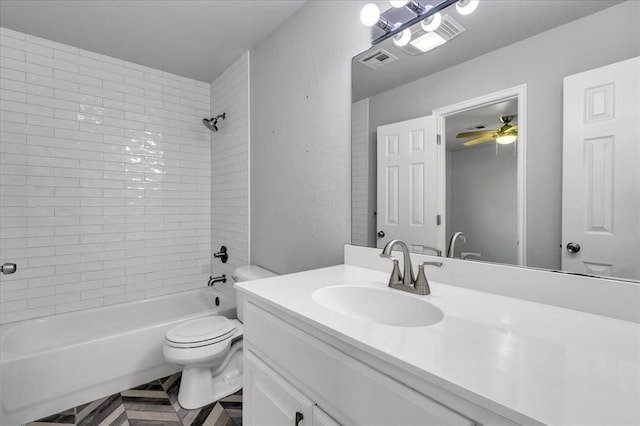 full bathroom with vanity, toilet, visible vents, and shower / bath combination