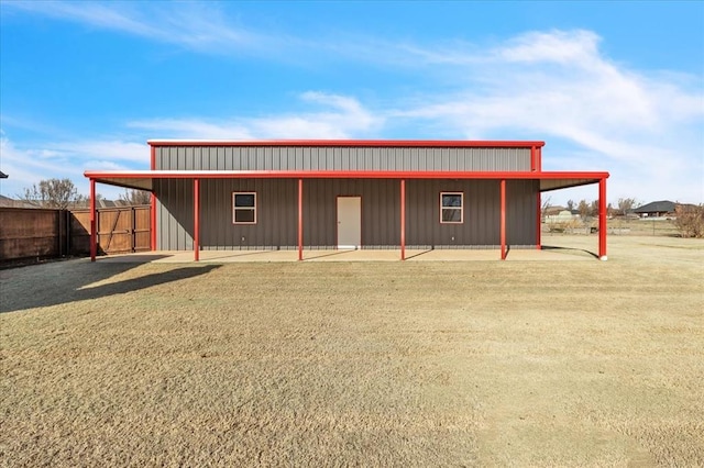 view of outdoor structure featuring fence