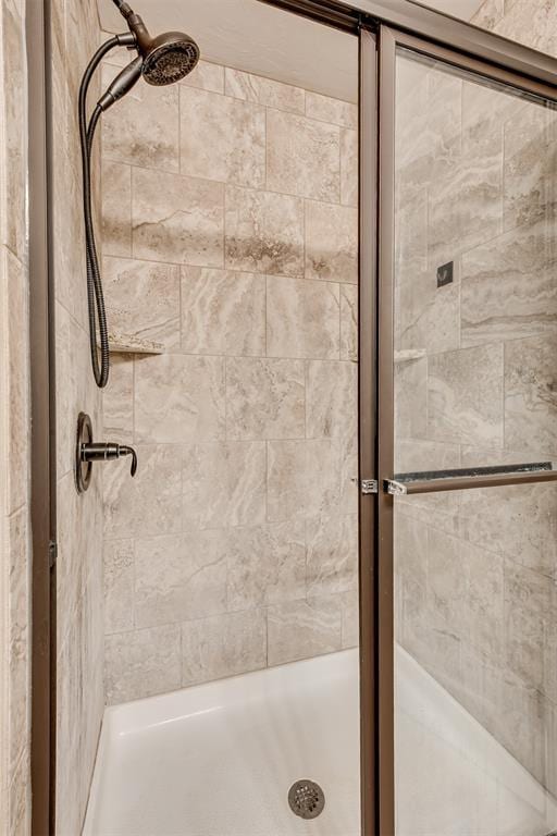 bathroom featuring a stall shower