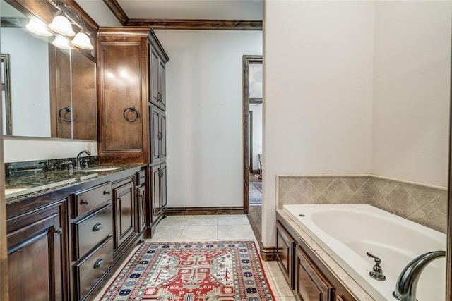 full bathroom featuring vanity, baseboards, ornamental molding, tile patterned floors, and a bath