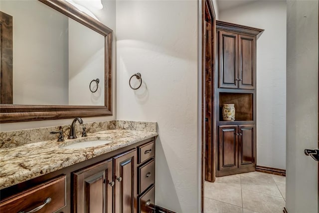 bathroom with vanity and tile patterned floors