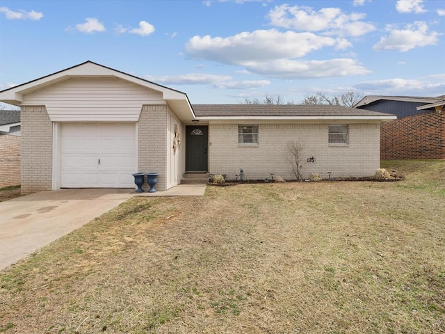 single story home featuring brick siding, driveway, an attached garage, and a front yard