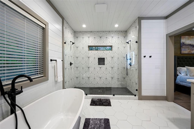 bathroom featuring wood ceiling, a freestanding bath, recessed lighting, tiled shower, and tile patterned floors