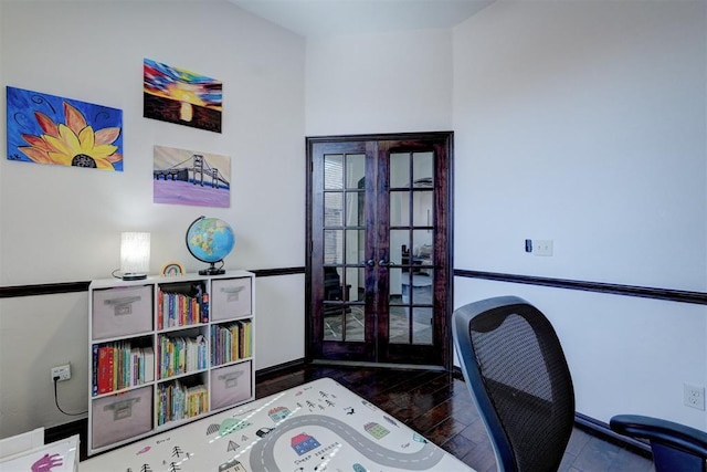 office space with french doors and wood finished floors