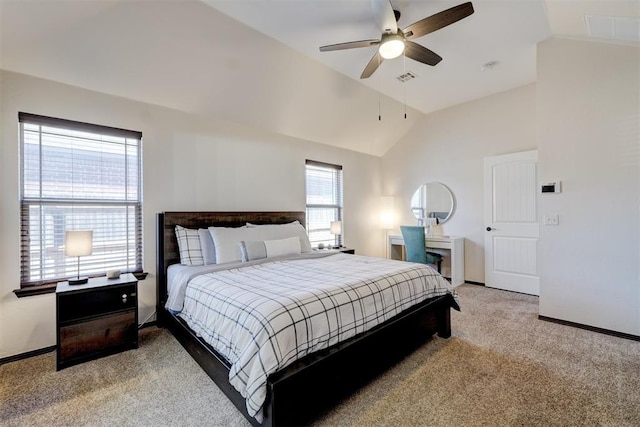 carpeted bedroom with lofted ceiling, visible vents, and baseboards