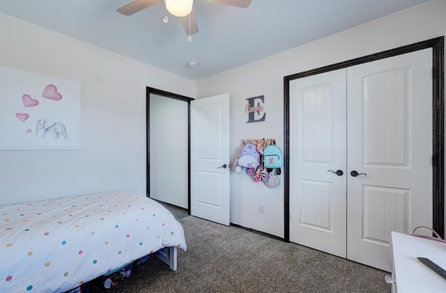 bedroom with a closet, carpet flooring, baseboards, and a ceiling fan