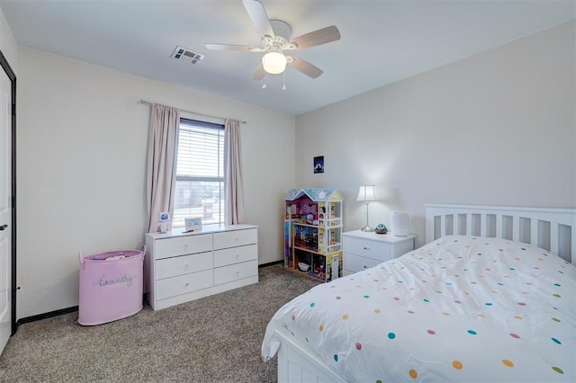 carpeted bedroom with visible vents and ceiling fan