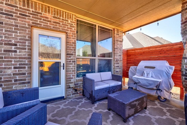 view of patio featuring an outdoor living space and grilling area