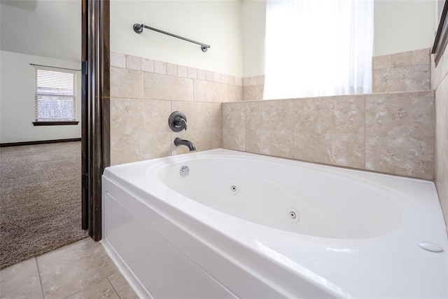 bathroom with a jetted tub