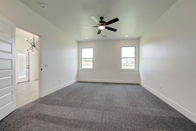 8101 Jenny Ln, Edmond, OK 73034 - spare room with carpet flooring, a chandelier, ceiling fan, baseboards, and recessed lighting