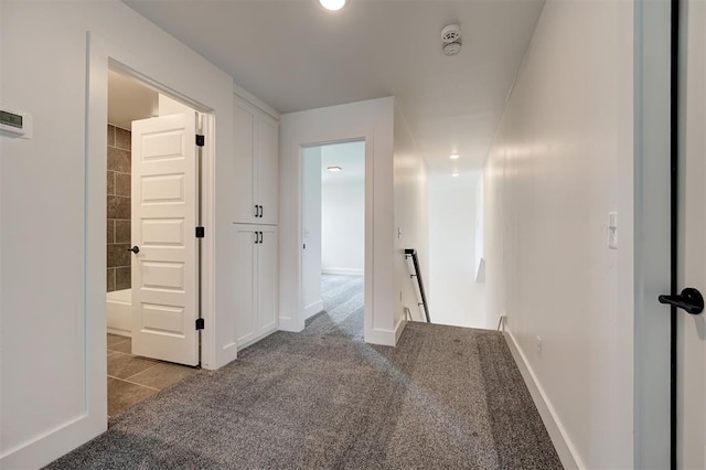 8101 Jenny Ln, Edmond, OK 73034 - hall with an upstairs landing, carpet floors, and baseboards