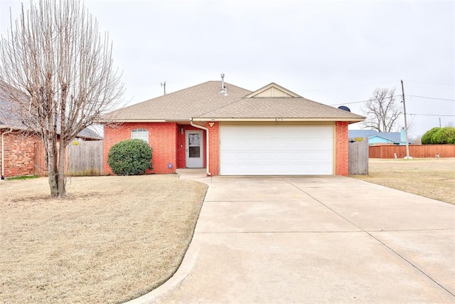 ranch-style house featuring brick siding, concrete driveway, an attached garage, and fence