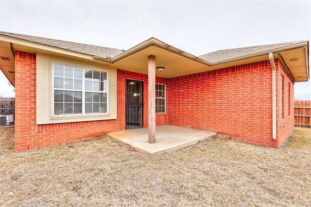 636 NW 112th St, Oklahoma City, OK 73114 - property entrance with brick siding and fence