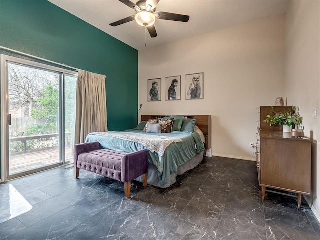 bedroom with baseboards, marble finish floor, a ceiling fan, and access to outside