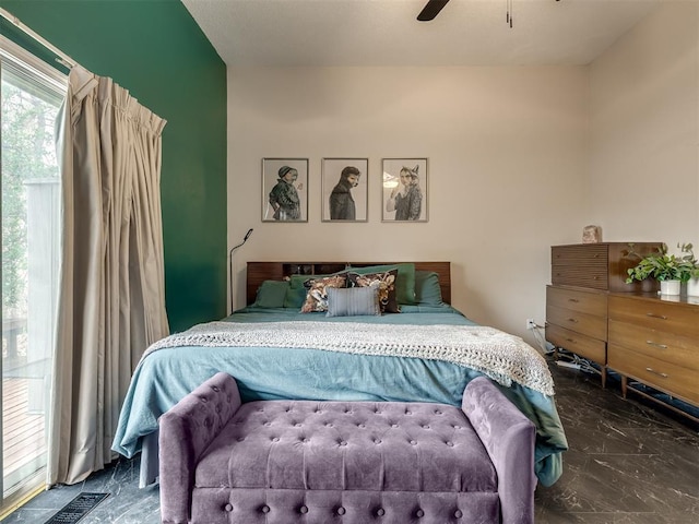 bedroom with visible vents, marble finish floor, and ceiling fan