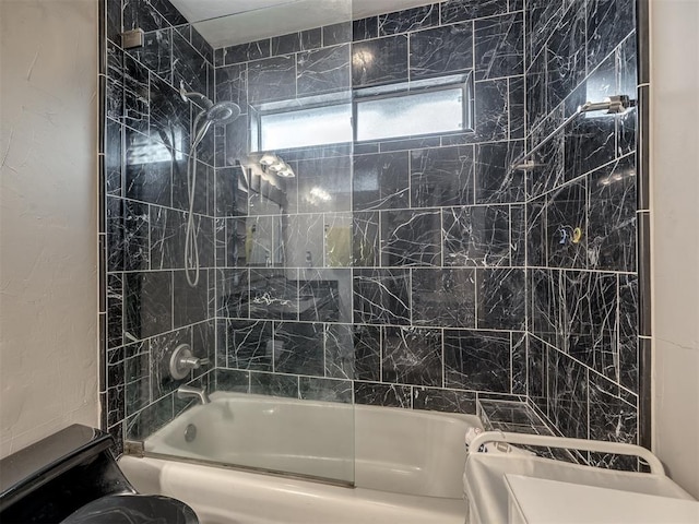 full bathroom with a wealth of natural light and bathtub / shower combination