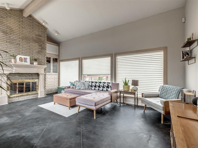 living room with brick wall, high vaulted ceiling, beam ceiling, a fireplace, and concrete flooring