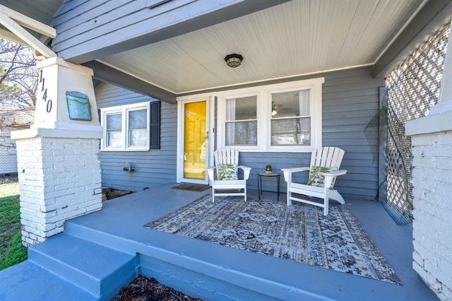 view of patio featuring a porch