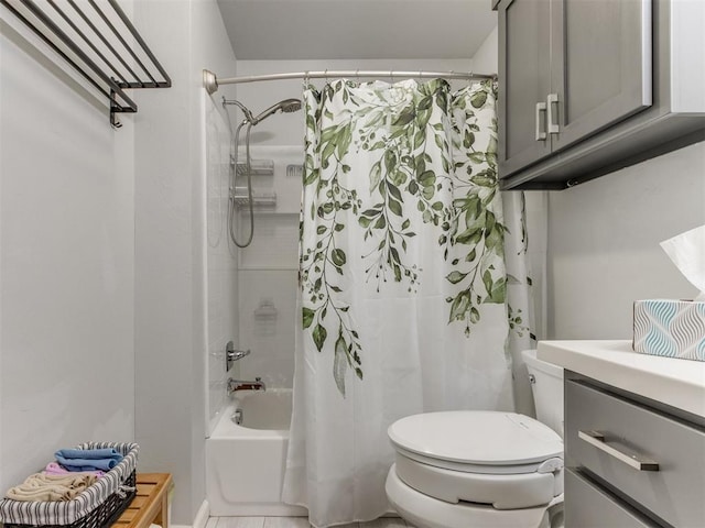 bathroom with shower / bath combo with shower curtain, toilet, and vanity