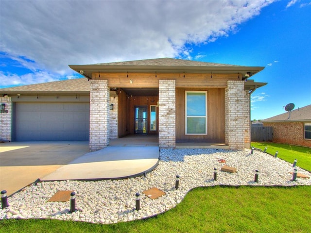 294 Emmy Jean Dr, Blanchard, OK 73010 - prairie-style home with an attached garage, a front yard, concrete driveway, and fence