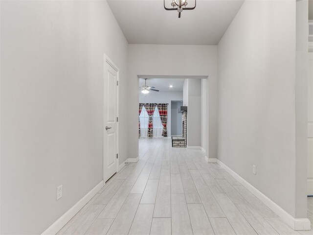 294 Emmy Jean Dr, Blanchard, OK 73010 - hallway featuring baseboards and light wood-style floors