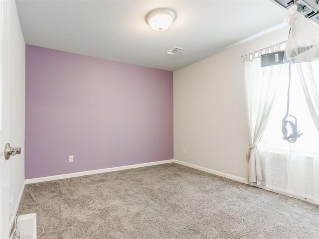 294 Emmy Jean Dr, Blanchard, OK 73010 - unfurnished room featuring visible vents, baseboards, and carpet flooring