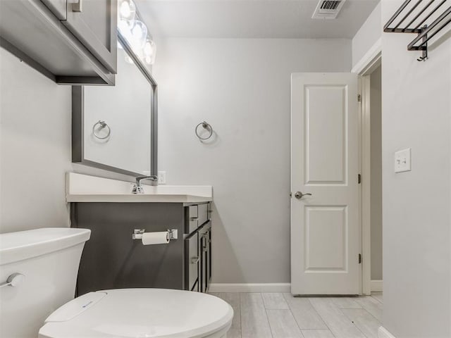 294 Emmy Jean Dr, Blanchard, OK 73010 - bathroom featuring baseboards, visible vents, vanity, and toilet